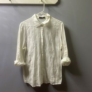 This is a limited button down tshirt. It is womens size XL.